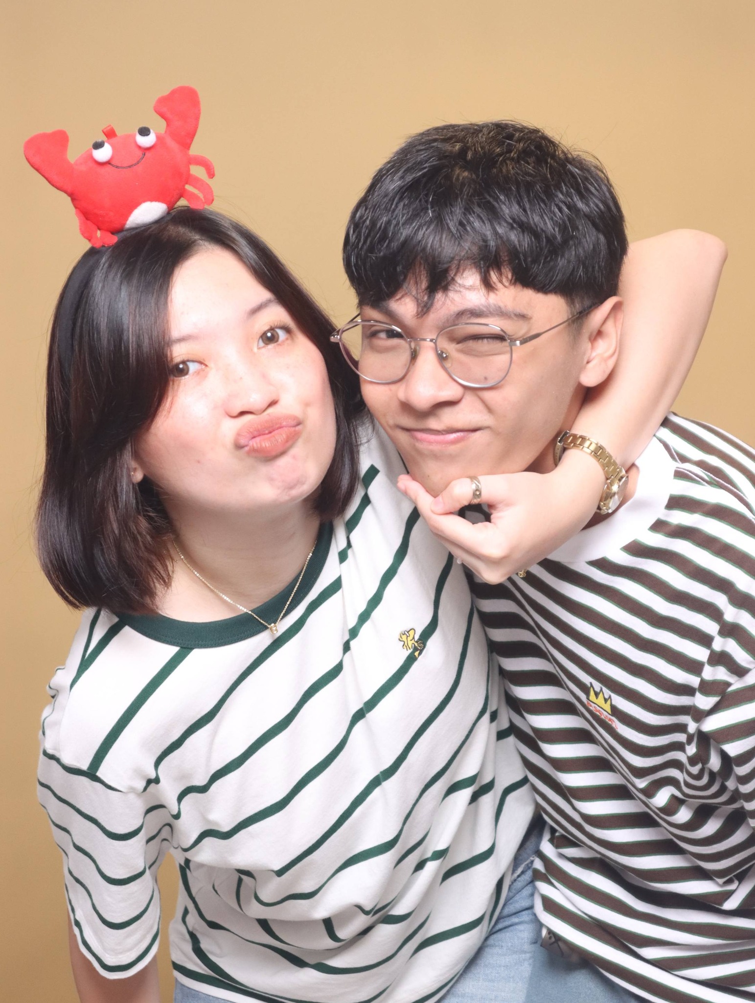 Duo portrait in striped shirts